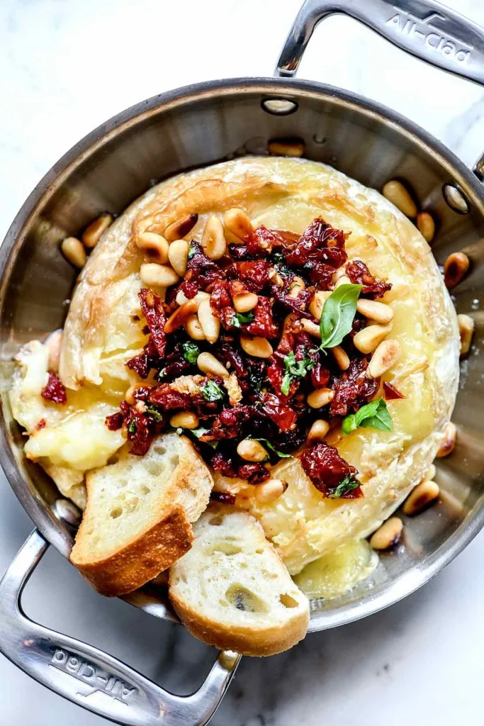 Baked Brie with Sun Dried Tomato and Pine Nuts