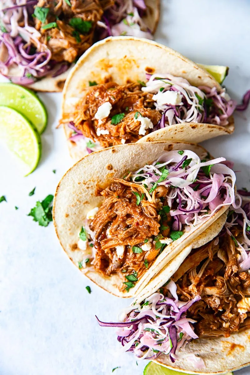 Slow Cooker Pulled Pork Tacos with Cilantro Lime Slaw