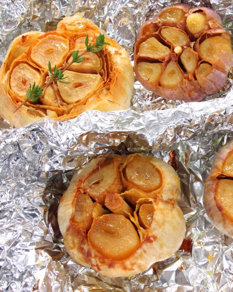 oven roasted garlic bulb wrapped in aluminum foil