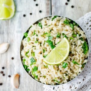 Cilantro Lime Rice in a bowl with a white background