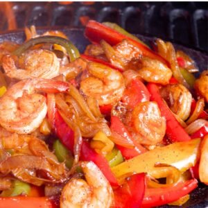 close up of shrimp fajitas with mixed bell peppers