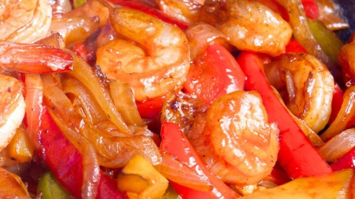 close up of shrimp fajitas with mixed bell peppers